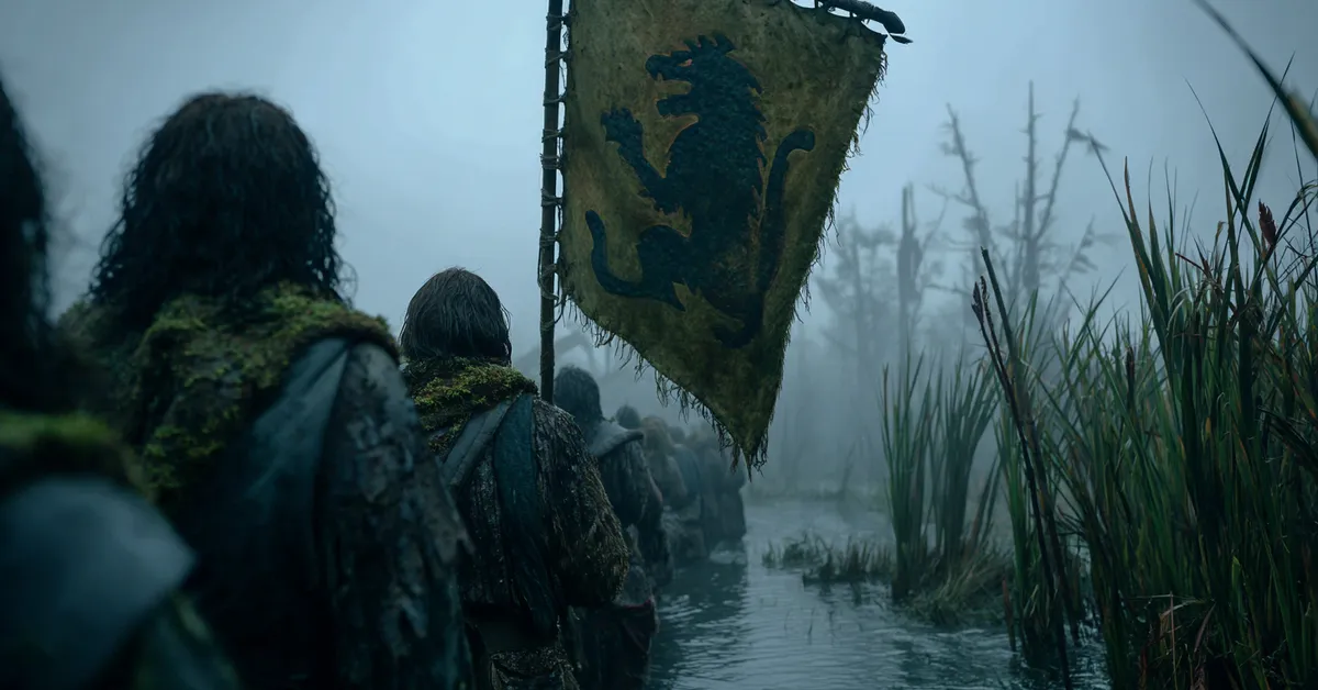 Elusive crannogmen scouts clad in reptile skins hide in the heavy fog and reeds of the Neck holding tattered banners showing a black lizard-lion